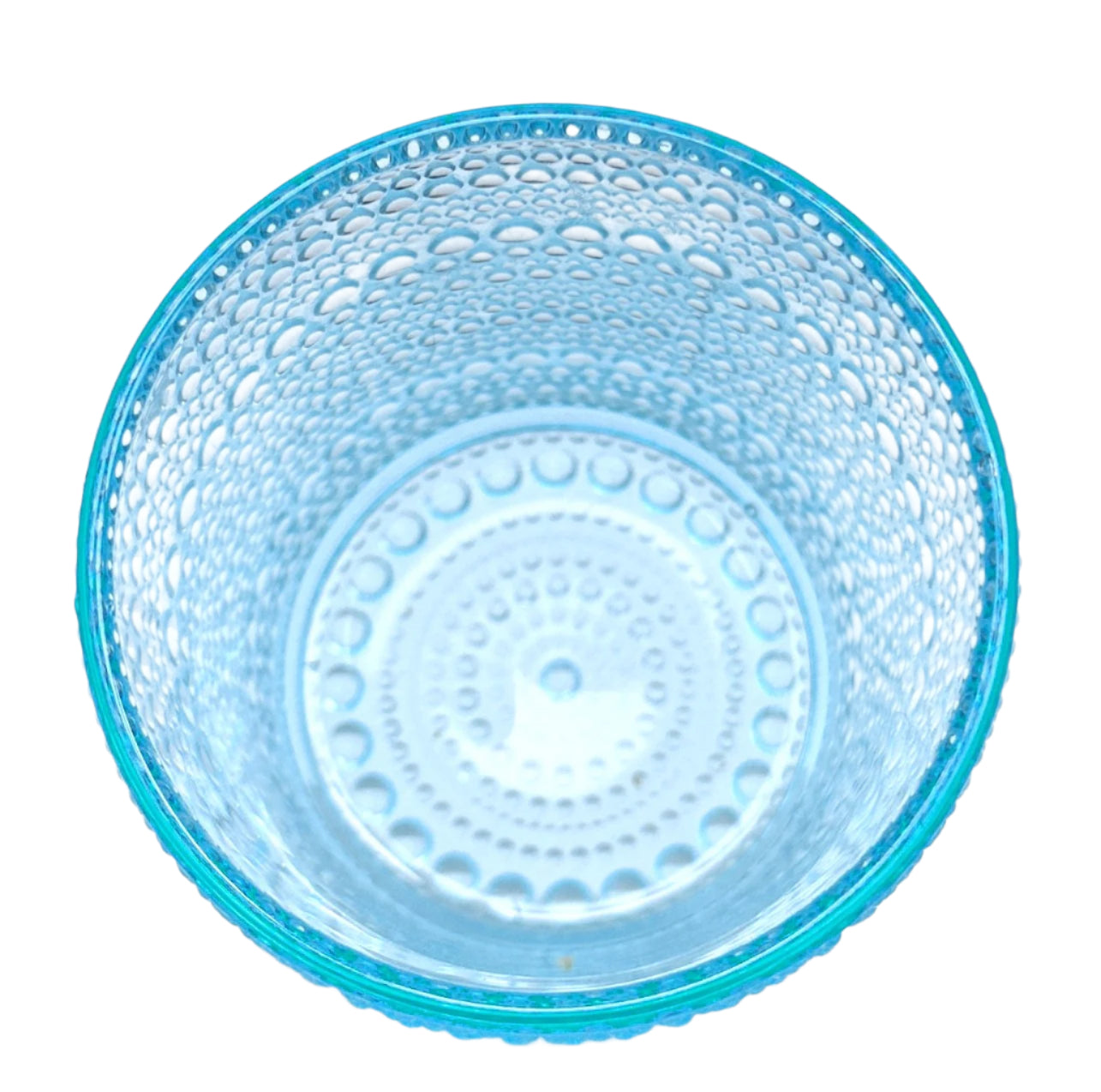 Blue hobnail stemless wine glass with textured surface on a white background