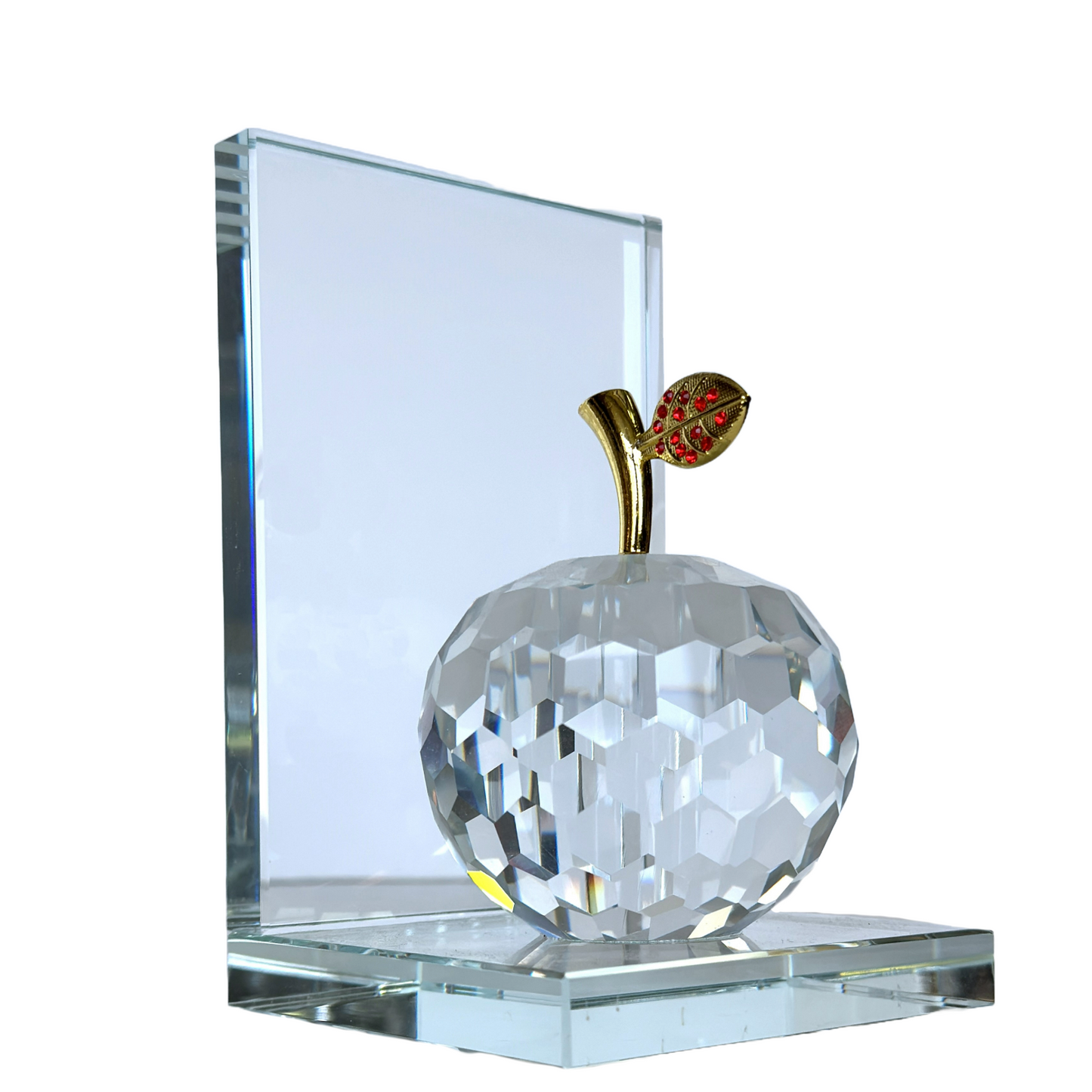 A Crystal apple bookend with gold stem