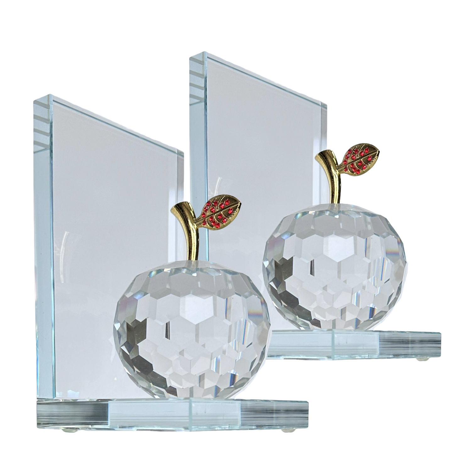 A set of two Crystal apple bookends with gold stem