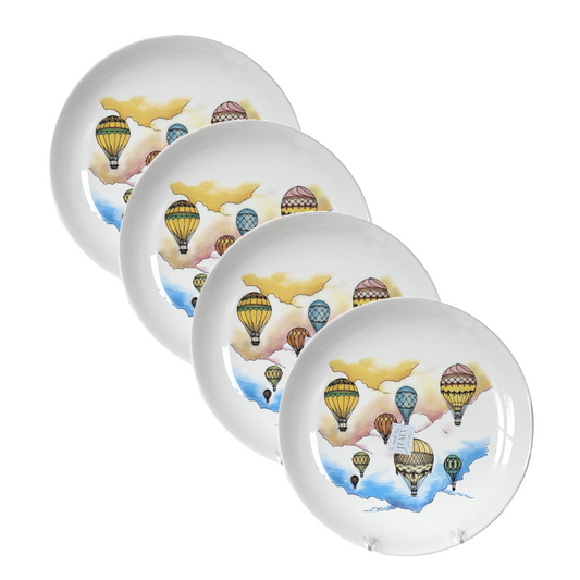 Set of four ceramic plates with hot air balloon design on a white background