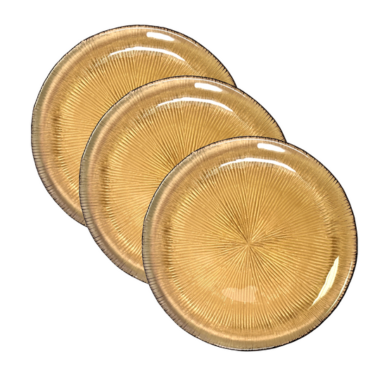 Three gold-colored plates with a textured design 