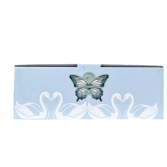 Two light blue mugs by Roy Kirkham with white swan designs on a white background