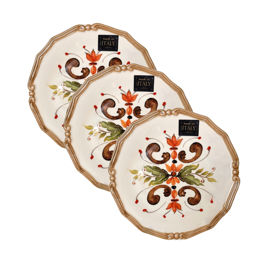 Three decorative plates with floral patterns on a white background