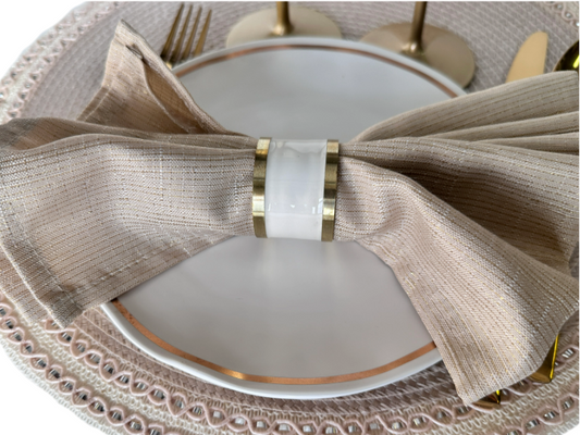 white napkin ring with gold rim
