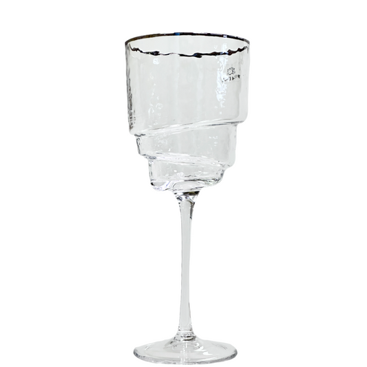 Clear glass wine glass on a white background