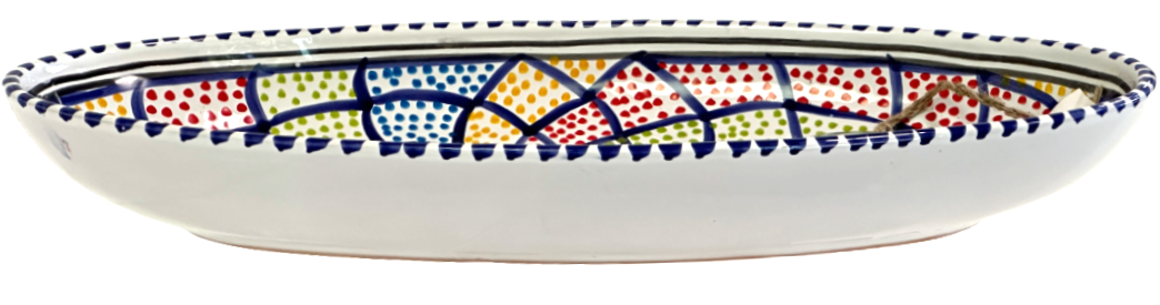 Ceramic plate with colorful geometric pattern on a white background