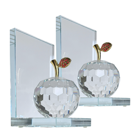 A set of two Crystal apple bookends with gold stem