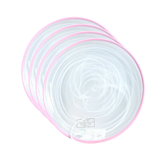 Set of white swirled plates with pink edges on a white background