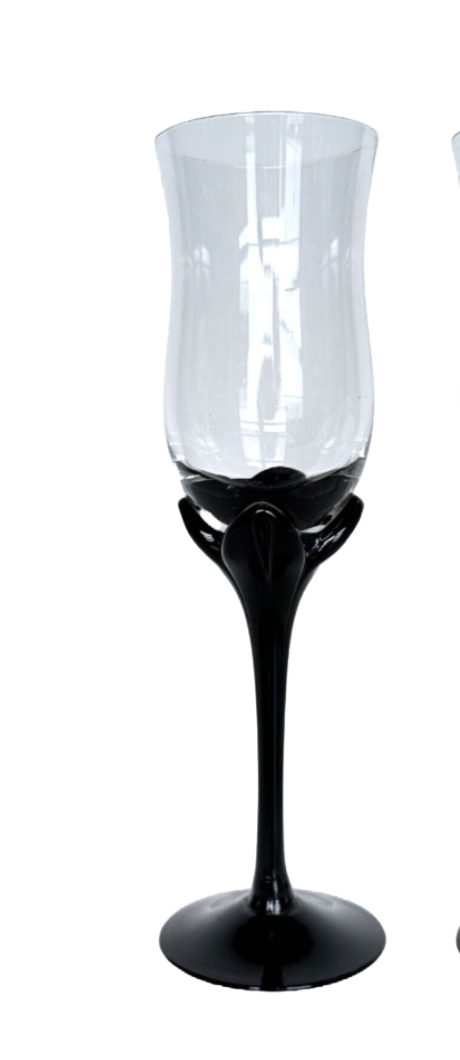 Clear glass with black base on a white background
