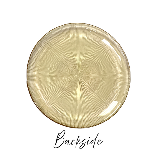 backside of textured gold  glass circular plates 