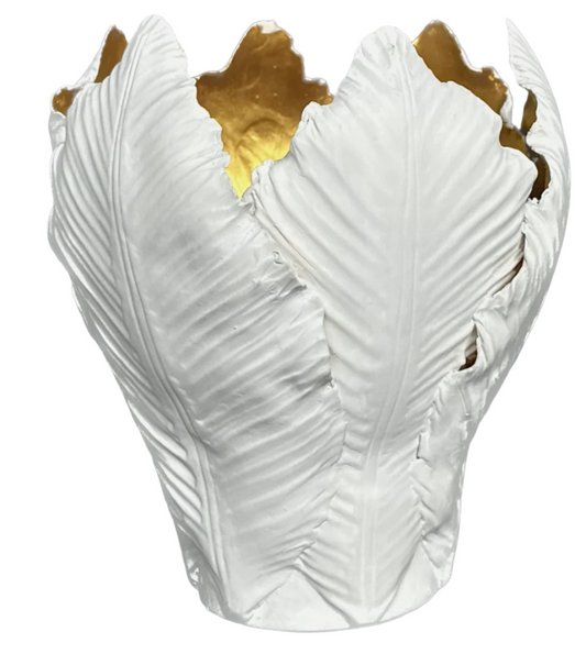 Decorative vase with white textured design and gold accents on a white background