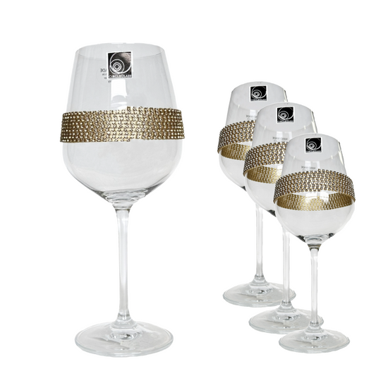 Set of wine glasses with gold decorative bands on a white background